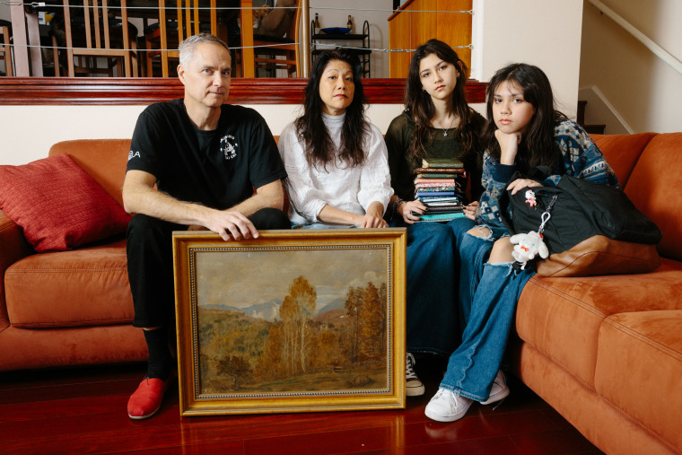 From left, Guy Horton, his wife, Sherin Wing, and their daughters, Jianling Horton and Kailing Horton