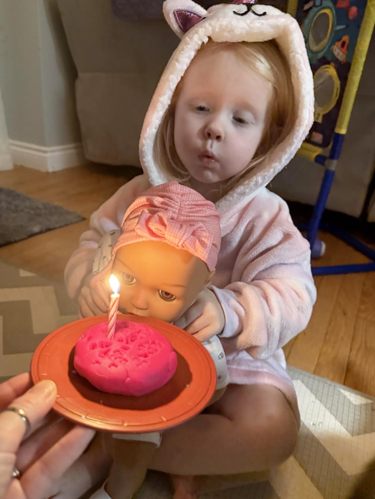 This proud mama helps Baby Rose/Cuckoo Kangaroof celebrate her birthday.