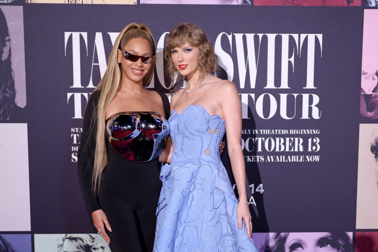 Beyoncé Knowles-Carter and Taylor Swift attend the "Taylor Swift:  The Eras Tour" Concert Movie World Premiere at AMC The Grove 14 on October 11, 2023 in Los Angeles, California. 