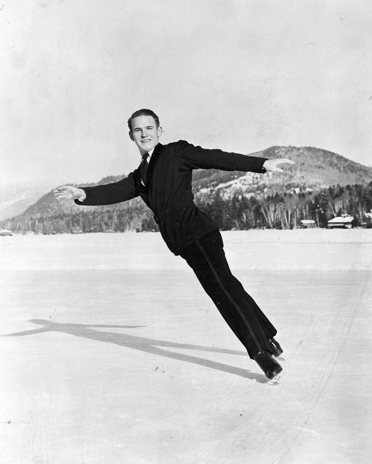 American ice skater Dick Button skates in a tuxedo on a frozen lake circa 1950.