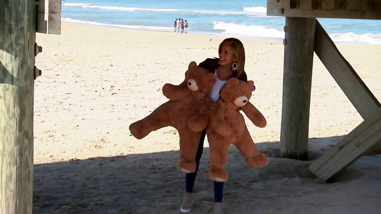 Hoda surprising the family on the beach a few years ago.