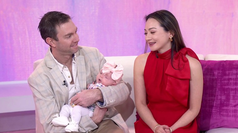 Christina Wong and Dean Kahn with their new baby girl on TODAY With Hoda & Jenna.