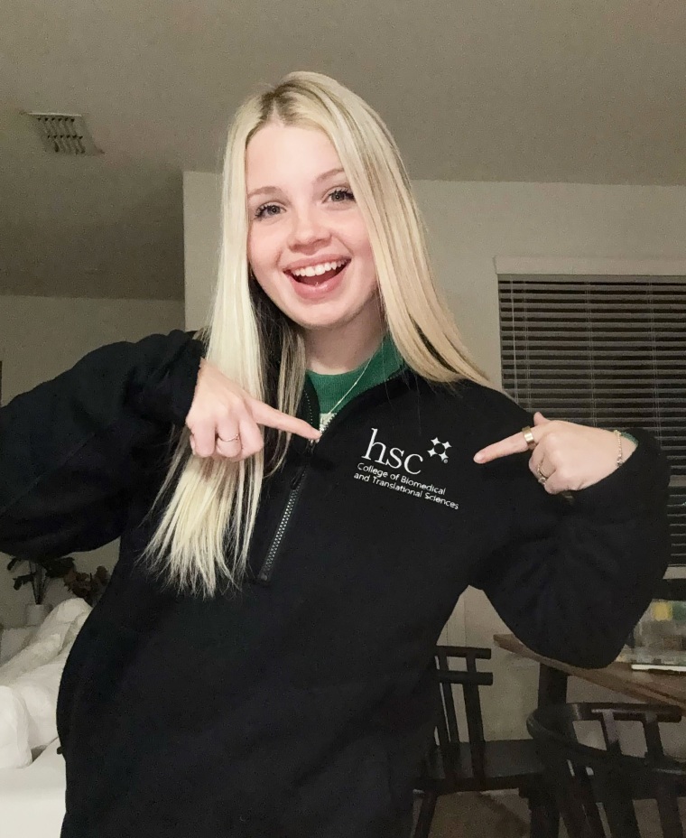 Maddie Lambert showed off her school jacket. 