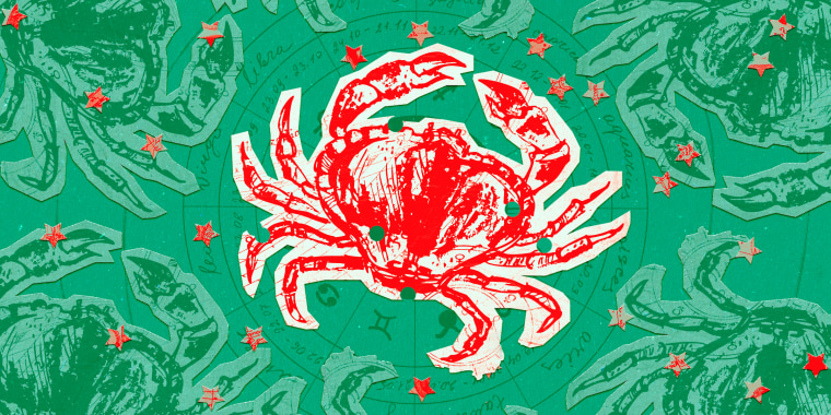 Paper cutout of the Cancer zodiac on a green background