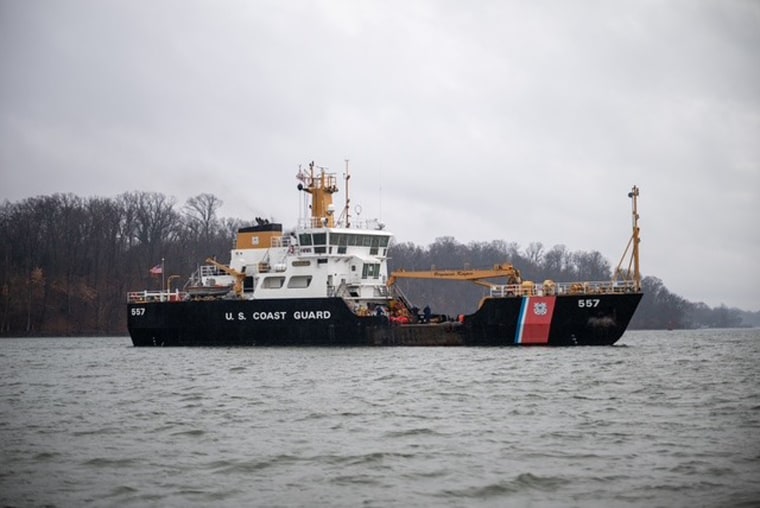 Photos shared with NBC News by U.S. Coast Guard of their response to the Potomac plane crash on Jan. 31.