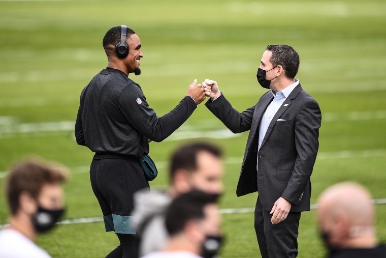 Philadelphia Eagles' Jalen Hurts, left, and Howie Roseman