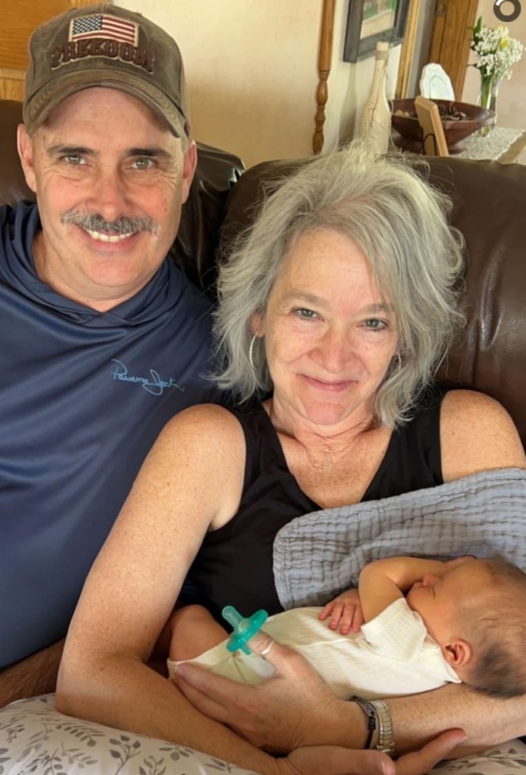 Doris Caldwell with her husband, Joel, and a granddaughter.