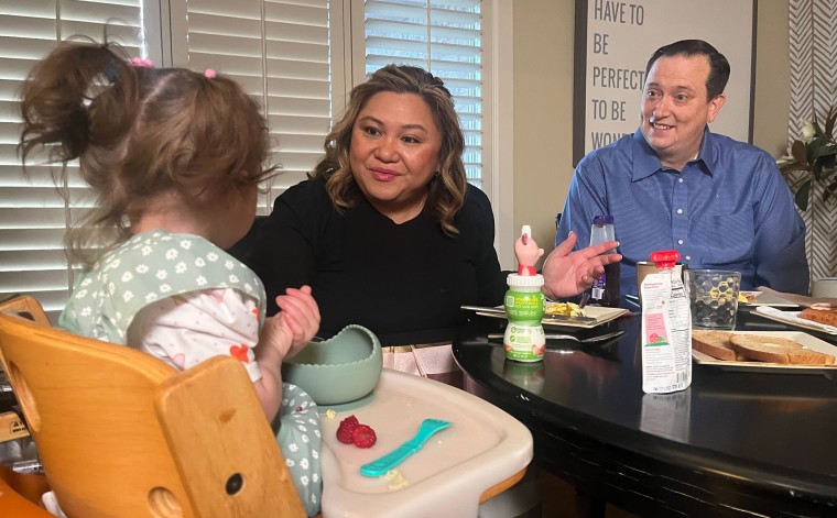 A family sitting at Texas breakfast, where there is a closure of one step. 