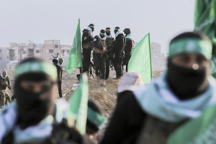 Hamas fighters gather outside