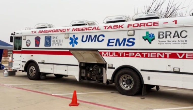 Health care workers at this mobile medical unit in Lubbock, Texas, are testing for measles and vaccinating people.