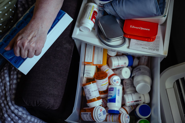 Some of Kaye Peterson’s prescription medications are seen in her room at Village of Lebanon assisted living facility