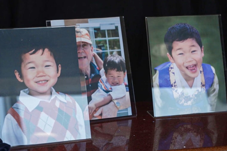 Printed photos on a counter.