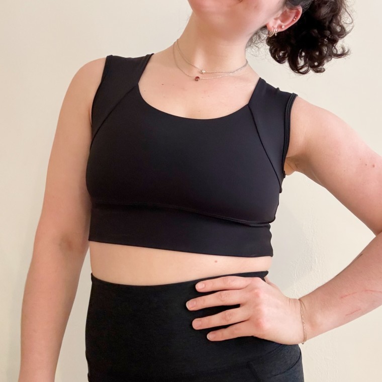 A woman wearing Forme’s Power Bra posture corrector.