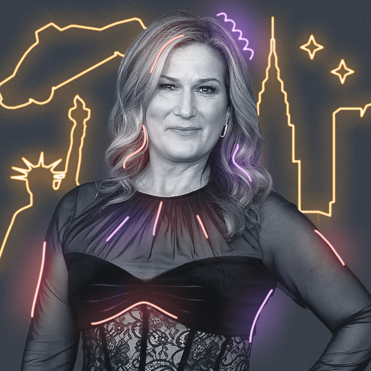 Ana Gasteyer with yellow neon signs behind them on a gray background