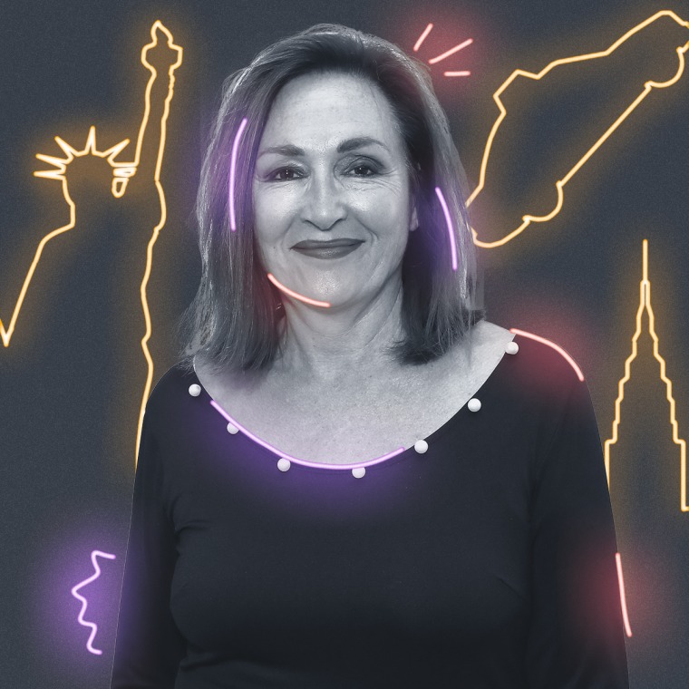 Nora Dunn with yellow neon signs behind them on a gray background