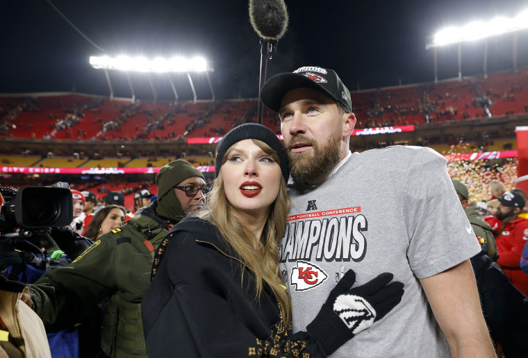 Taylor Swift celebrates with Travis Kelce #87 of the Kansas City Chiefs after defeating the Buffalo Bills 32-29 in the AFC Championship Game at GEHA Field at Arrowhead Stadium on January 26, 2025 in Kansas City, Missouri.