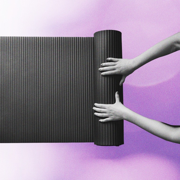 Cropped image of a person rolling out a yoga mat, in black and white against a gradient purple background.