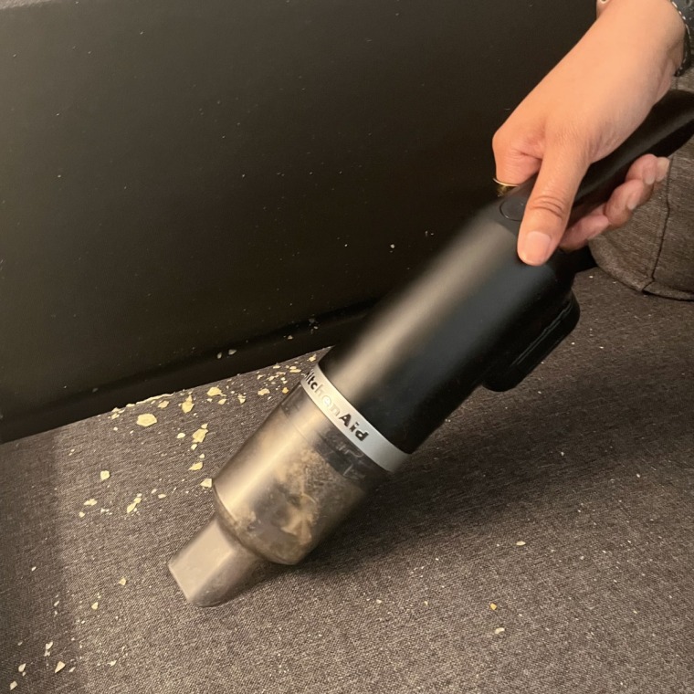 The cordless vacuum can pick up crumbs, hair and more