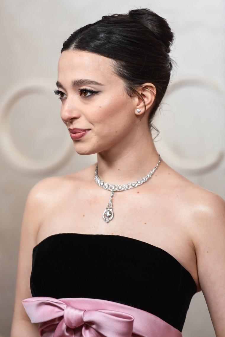 Best Actress nominee Mikey Madison dazzles on her first Oscars red carpet.