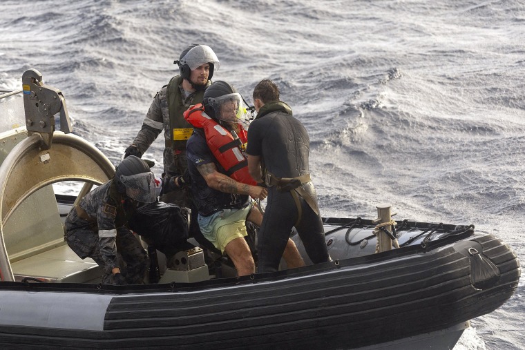 An Australian warship on Monday rescued a Lithuanian solo rower who had encountered a tropical cyclone while attempting to cross the Pacific Ocean from California.