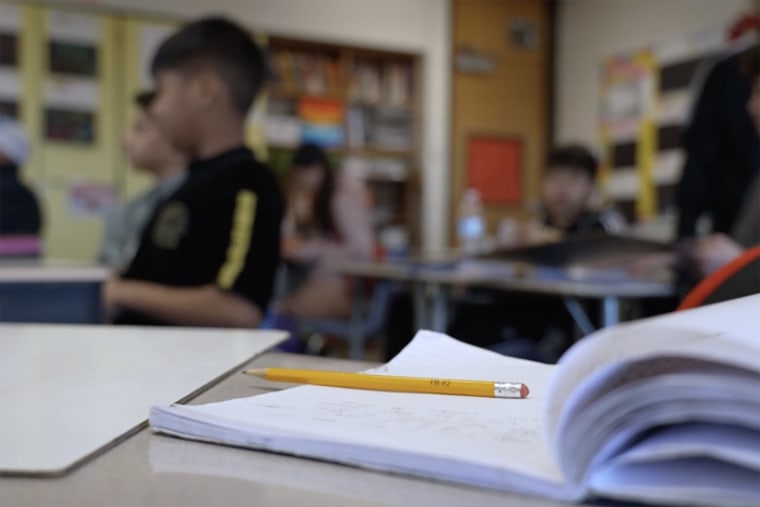 Spanish-speaking students at a school in Denver learn how to pronounce phrases in English.