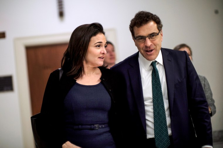 Facebook Chief Operating Officer Sheryl Sandberg and Vice President of global communications and public policy Elliot Schrage