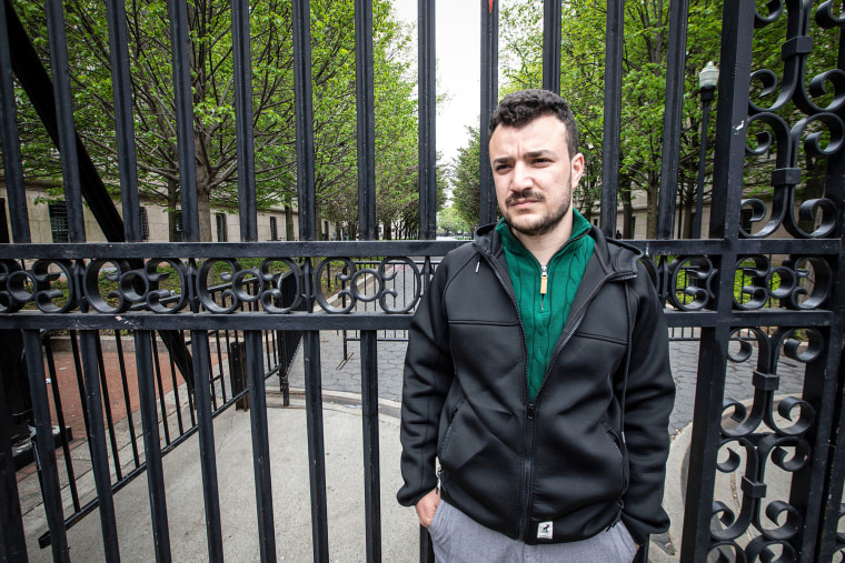 Mahmoud Khalil stands by the gates of Columbia University