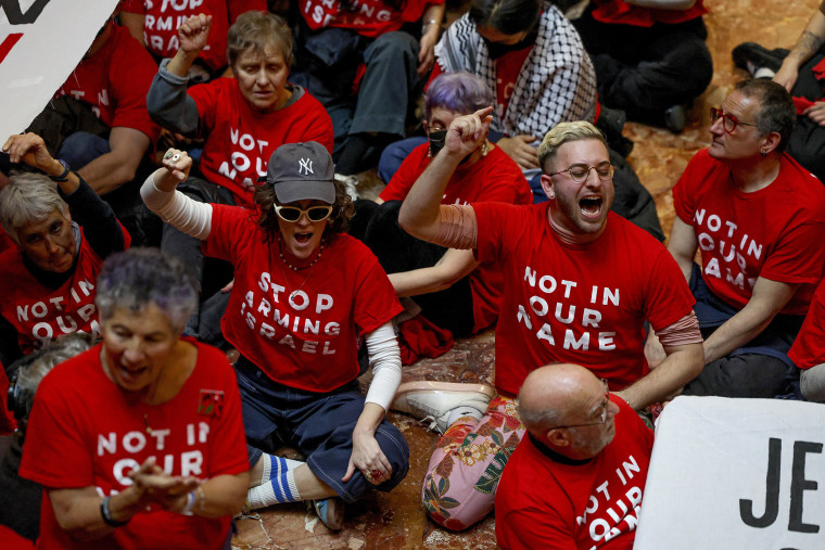 Nearly 100 protesters arrested after sit-in at Trump Tower in NYC to ...