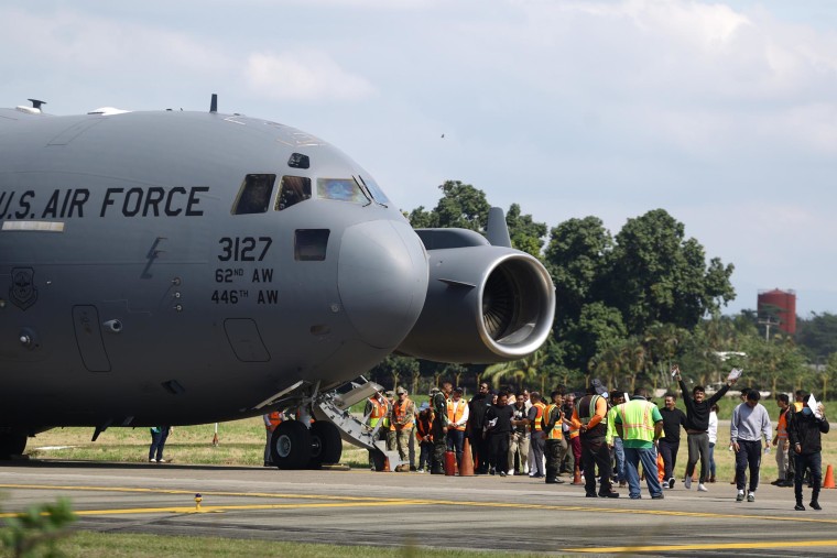 A U.S. Air force flight carrying deported migrants arrives at Ramon Villeda Morales International Airport on Jan. 31, 2025 in San Pedro Sula, Honduras. 