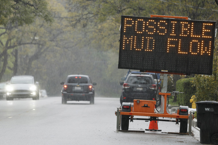 = Rain during the storm, river, atmosphere with a sign to read 'Possible mud flow' on March 12, 2025 in Cerra Med Ratt California.