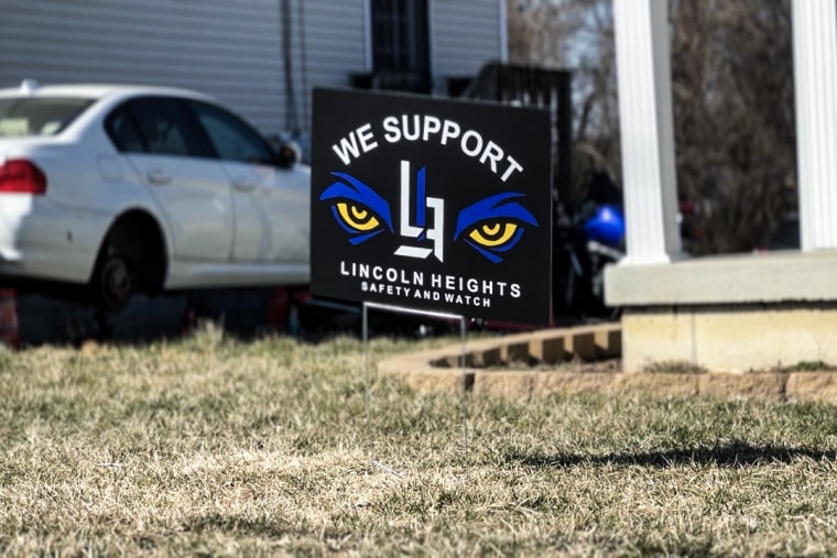 Signs showing support for the Lincoln Heights Safety and Watch Program can be seen peppered throughout the town.