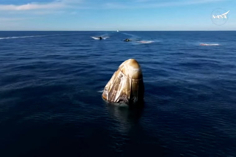 Image: dragon capsule post splashdown after