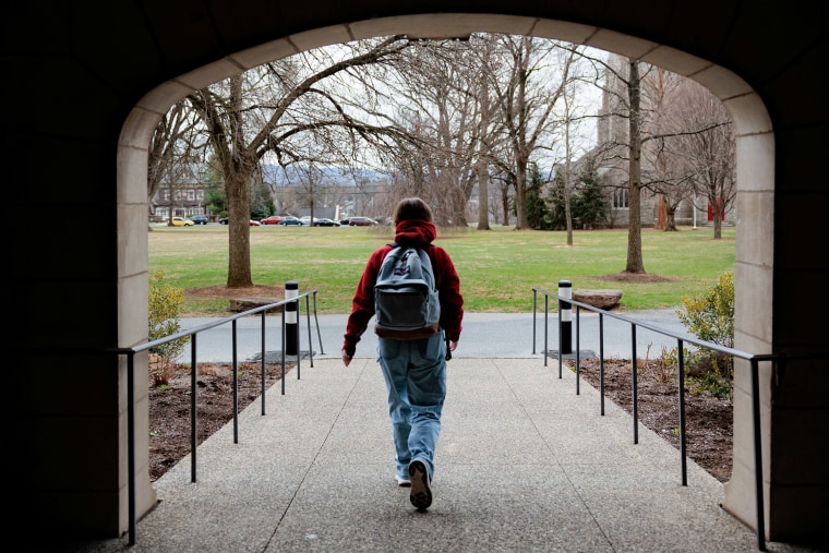 A person walks on campus at Muhlenberg College in Allentown