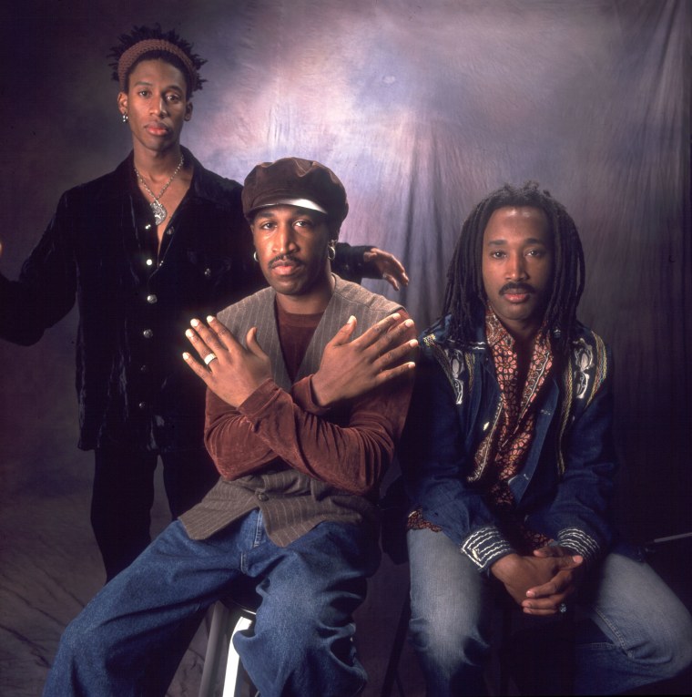 Portrait of the members of American R&B group Tony Toni Tone (styled as Tony! Toni! Tone!) as they pose together, Chicago, Illinois, October 2, 1993. Pictured are, from left, Timothy Christian Riley and his cousins, brothers Raphael Saadiq (born Charles Wiggins) and D'wayne Wiggins. 