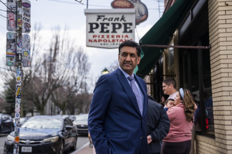 Rep. Ro Khanna waits for a table at Frank Pepe Pizzeria