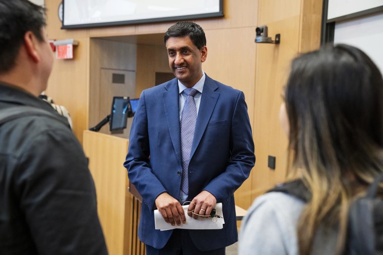 Rep. Ro Khanna speaks with guests following a speech at Yale Law School