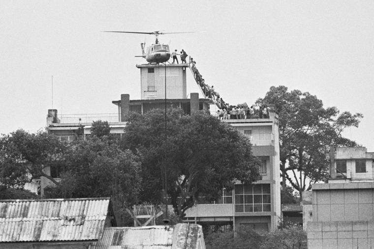 Helicopter Evacuating Crowd from Rooftop