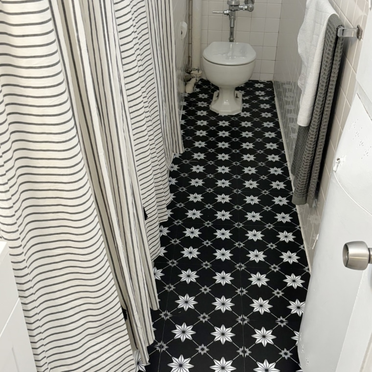 Geometric floor pop tiles in a bathroom.