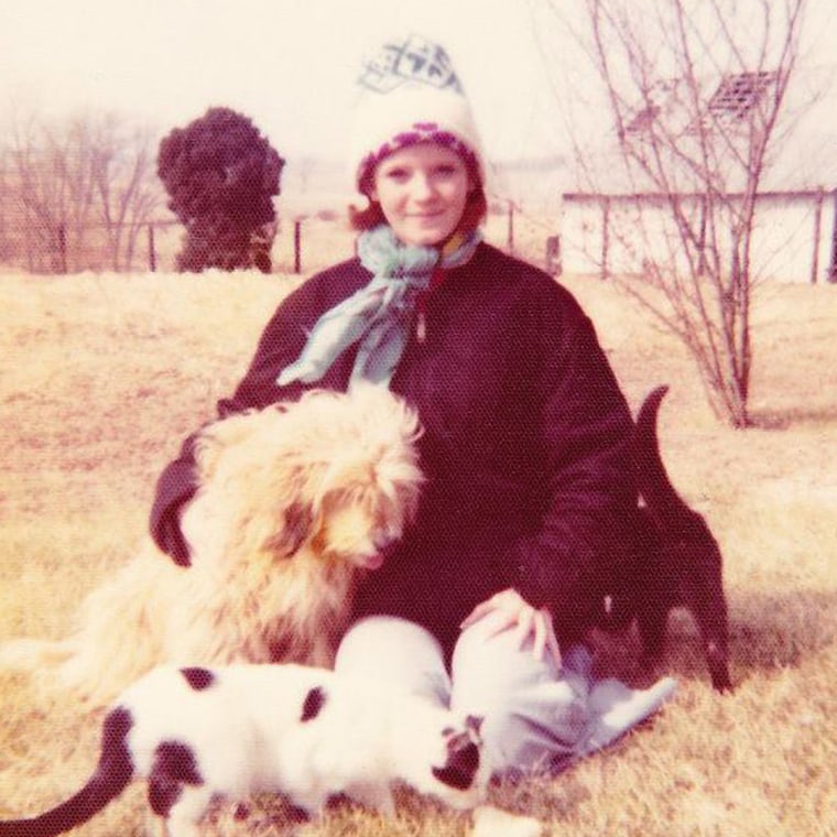 Cheryl Scherer surrounded by animals