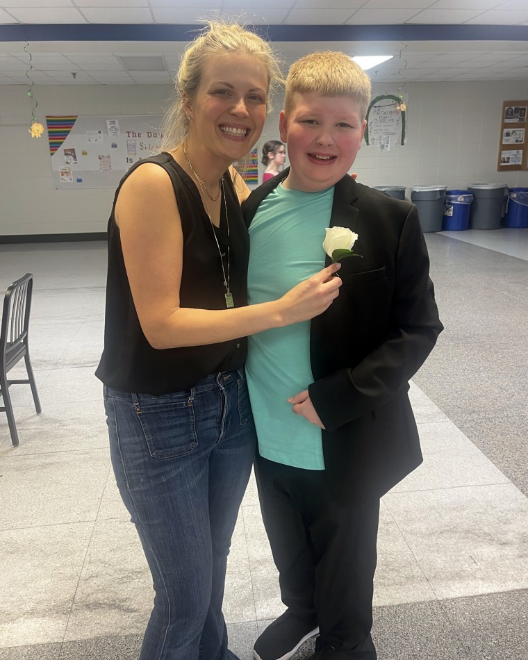 Kate Swenson and her son, Cooper, 14, who has autism. Swenson and two other moms wrote the book "Autism Out Loud" about their parenting experience.