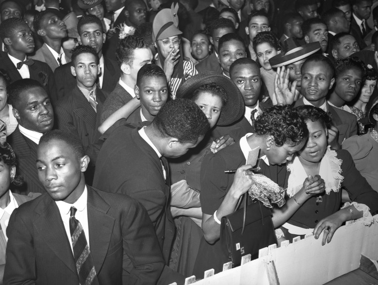 The crowd watching the orchestra at the Savoy Ballroom in Chicago, Illinois in 1941.