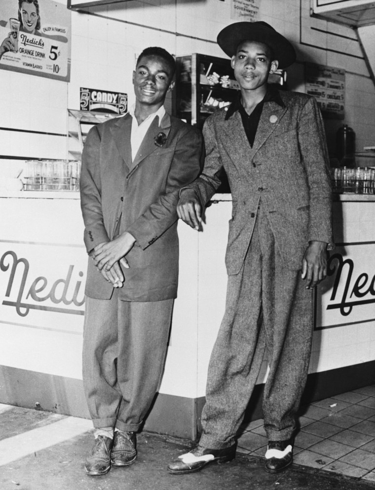 Teen boys dressed in zoot suits circa 1943.