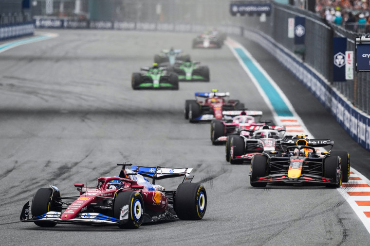 Racecars on a race track