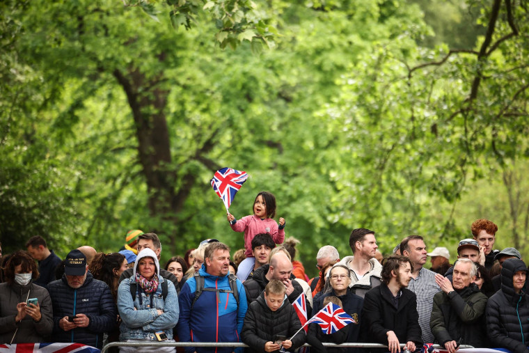 A child waves a Union Jack flag on The Mall in London on May 5, 2025 during the procession to celebrate the 80th anniversary of VE Day.