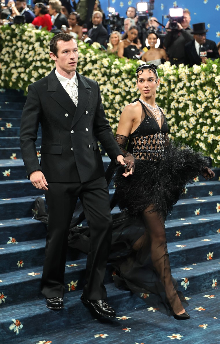 Couple Callum Turner and Dua Lipa know how to turn heads.