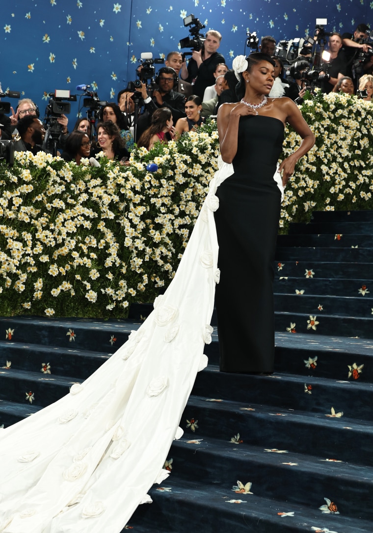 Gabrielle Union channels Old Hollywood glamour on the steps of the Met Gala.