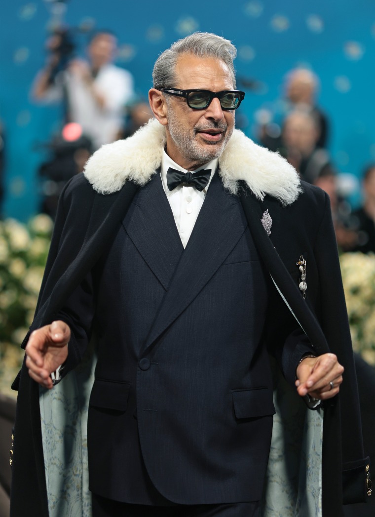 Jeff Goldblum looks dapper as usual in a shearling cape.