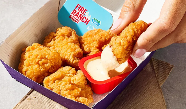 Taco Bell Crispy Chicken Nuggets with Fire Ranch dipping sauce.