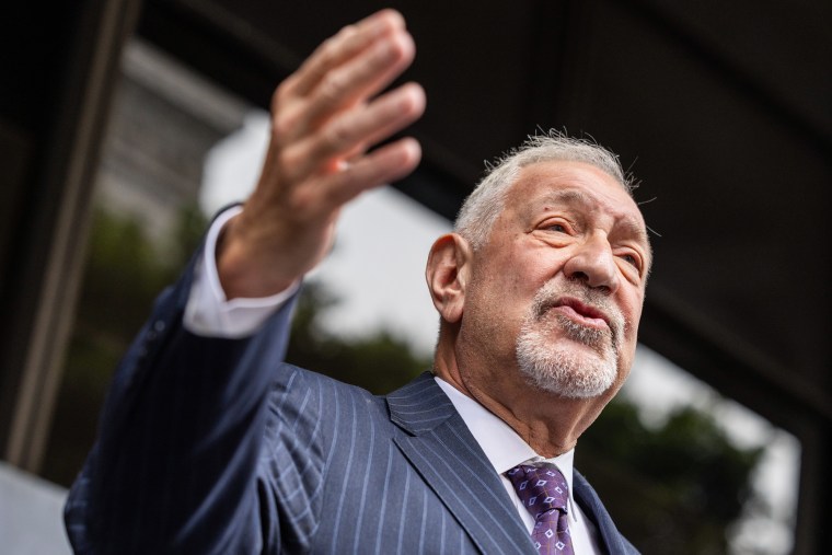 Mark Geragos speaks and gestures with his hand