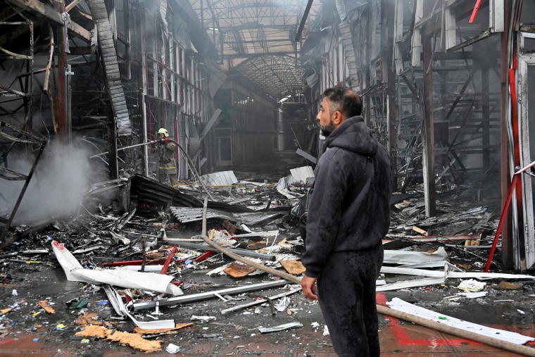 Russian forces intercepted more than 100 Ukrainian drones fired at almost a dozen regions of Russia, the Defense Ministry in Moscow said Tuesday, in an attack that forced all four airports around Moscow to temporarily suspend flights.